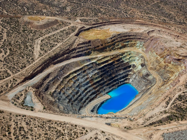 Open pit mine with water at the bottom